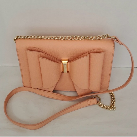 Elegant Peach Crossbody Bag with Bow Accent
NWOT - Picture 2 of 7